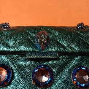 Two kurt geiger purses 250$ for the blue one and 205 for the rainbow purse